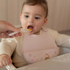 Bavetta in silicone Rosa 108034565406 corredino e abbigliamento neonato | NANU' BABY