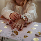 Calendario dell'avvento con regali (braccialetti, charms e stickers) Multicolore 126664 corredino e abbigliamento neonato | NANU' BABY